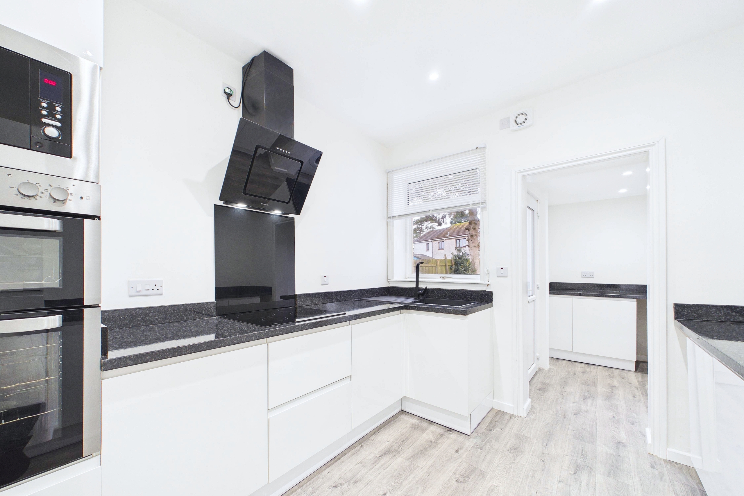 three bedroom mid terraced house in Newton Mearns, Glasgow