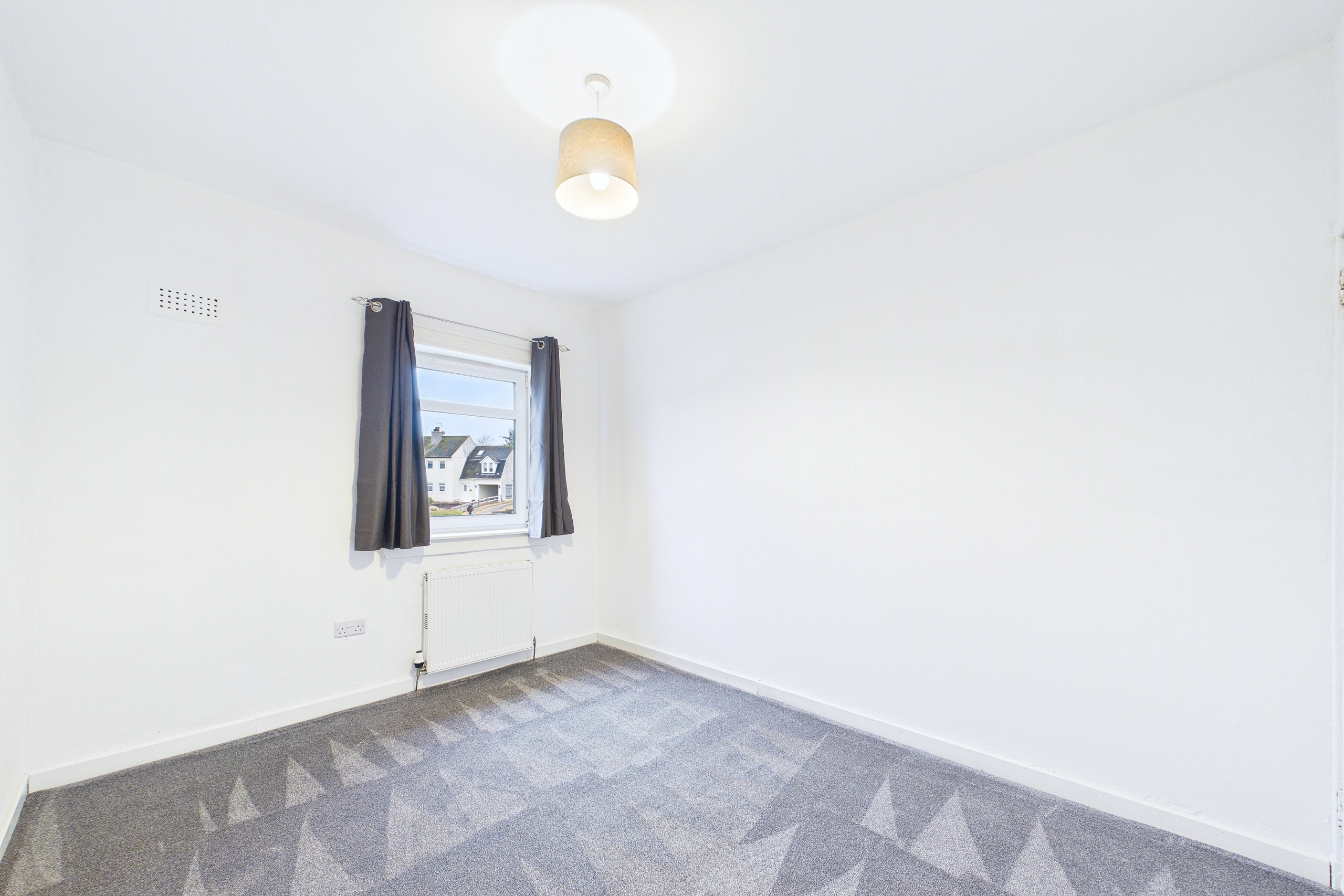 three bedroom mid terraced house in Newton Mearns, Glasgow