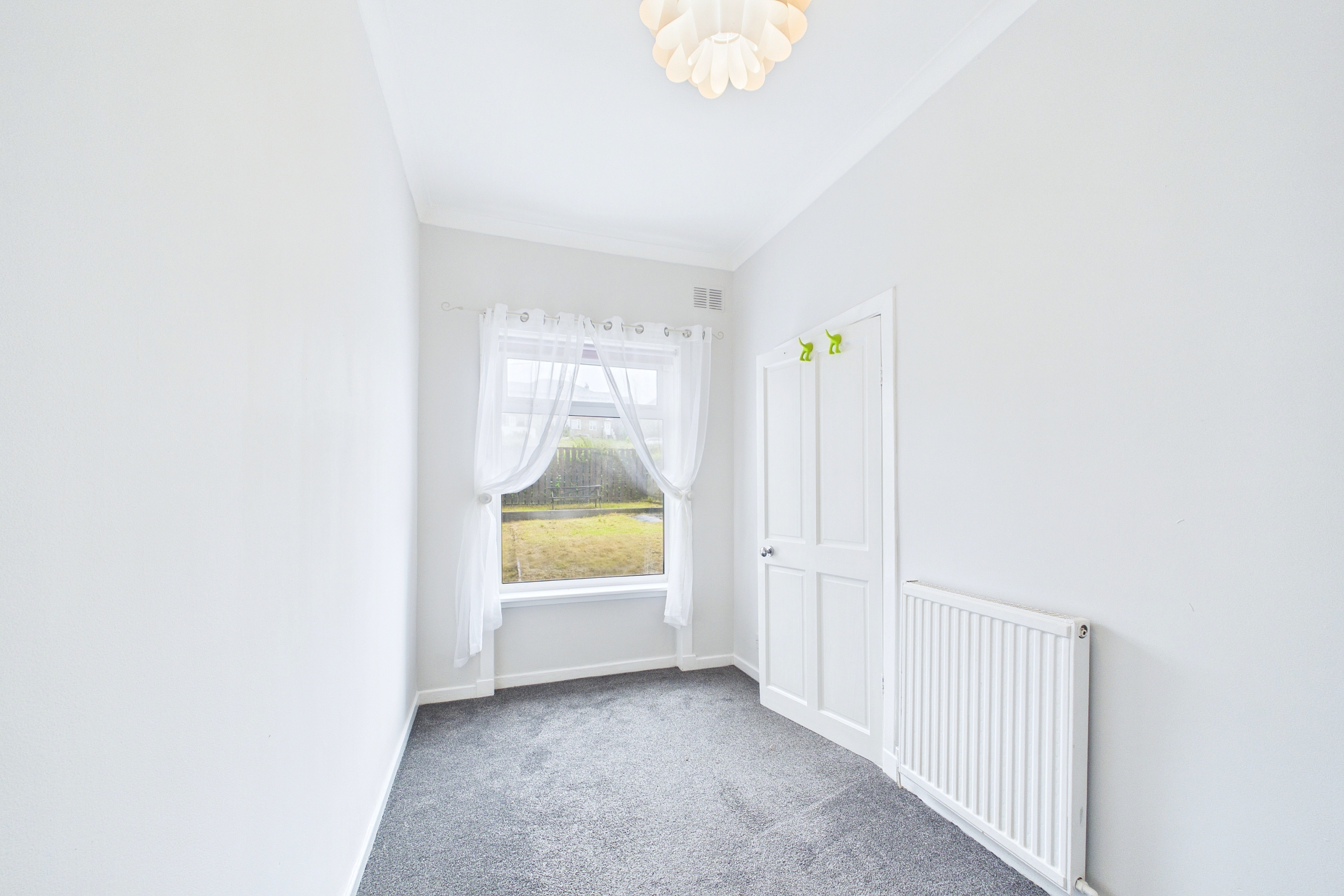 three-bedroom ground floor cottage flat for sale in Hillington