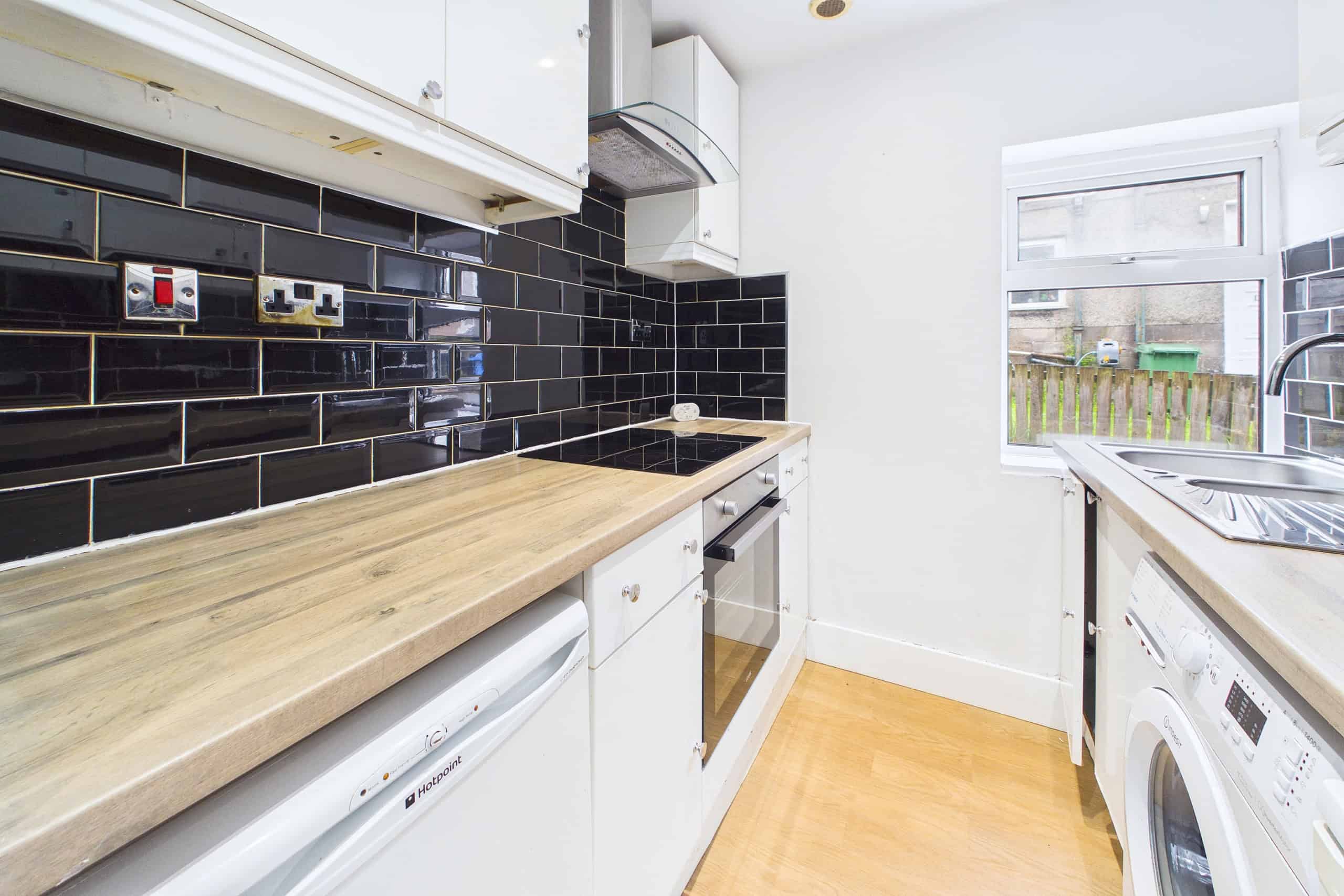 three-bedroom ground floor cottage flat for sale in Hillington
