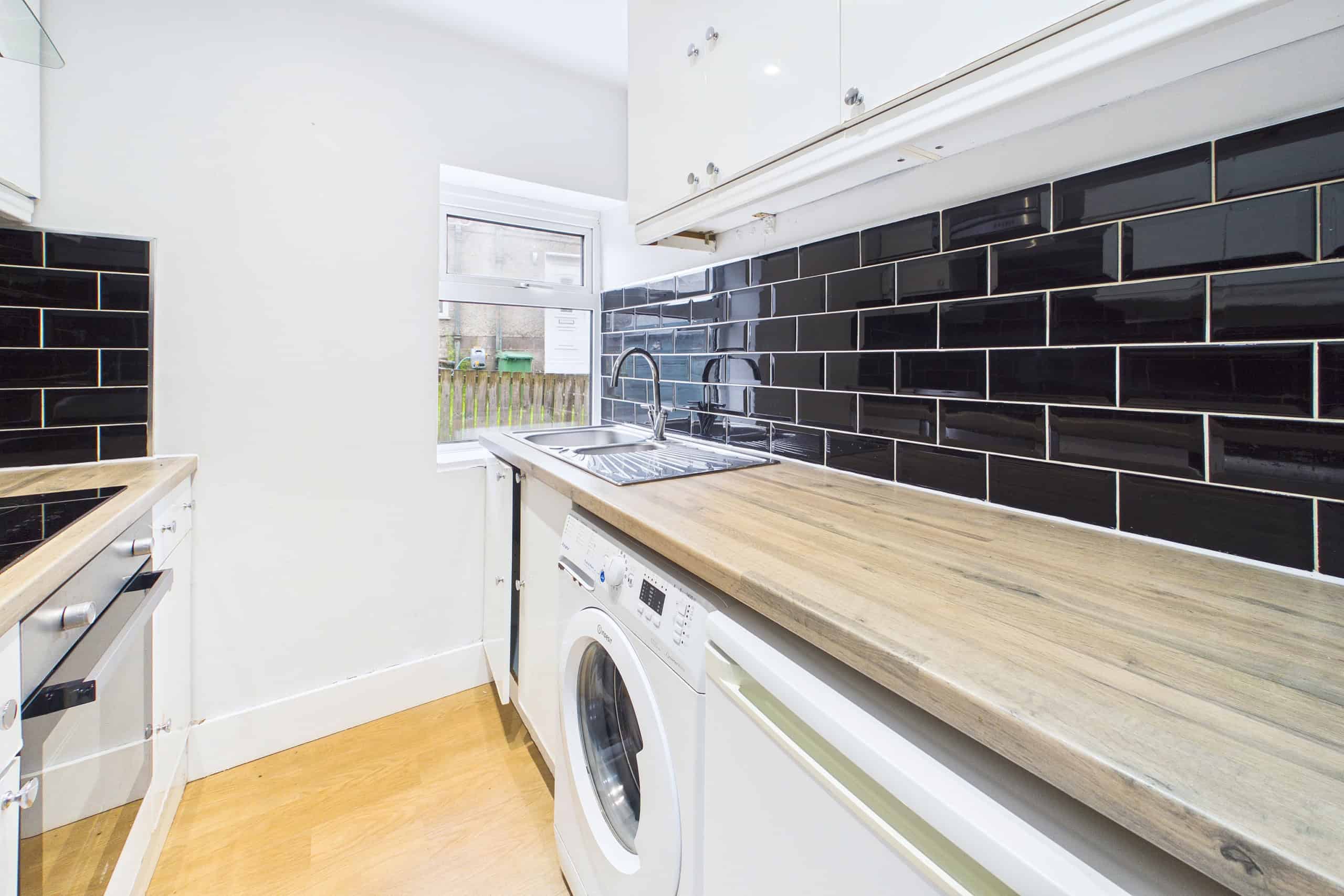 three-bedroom ground floor cottage flat for sale in Hillington
