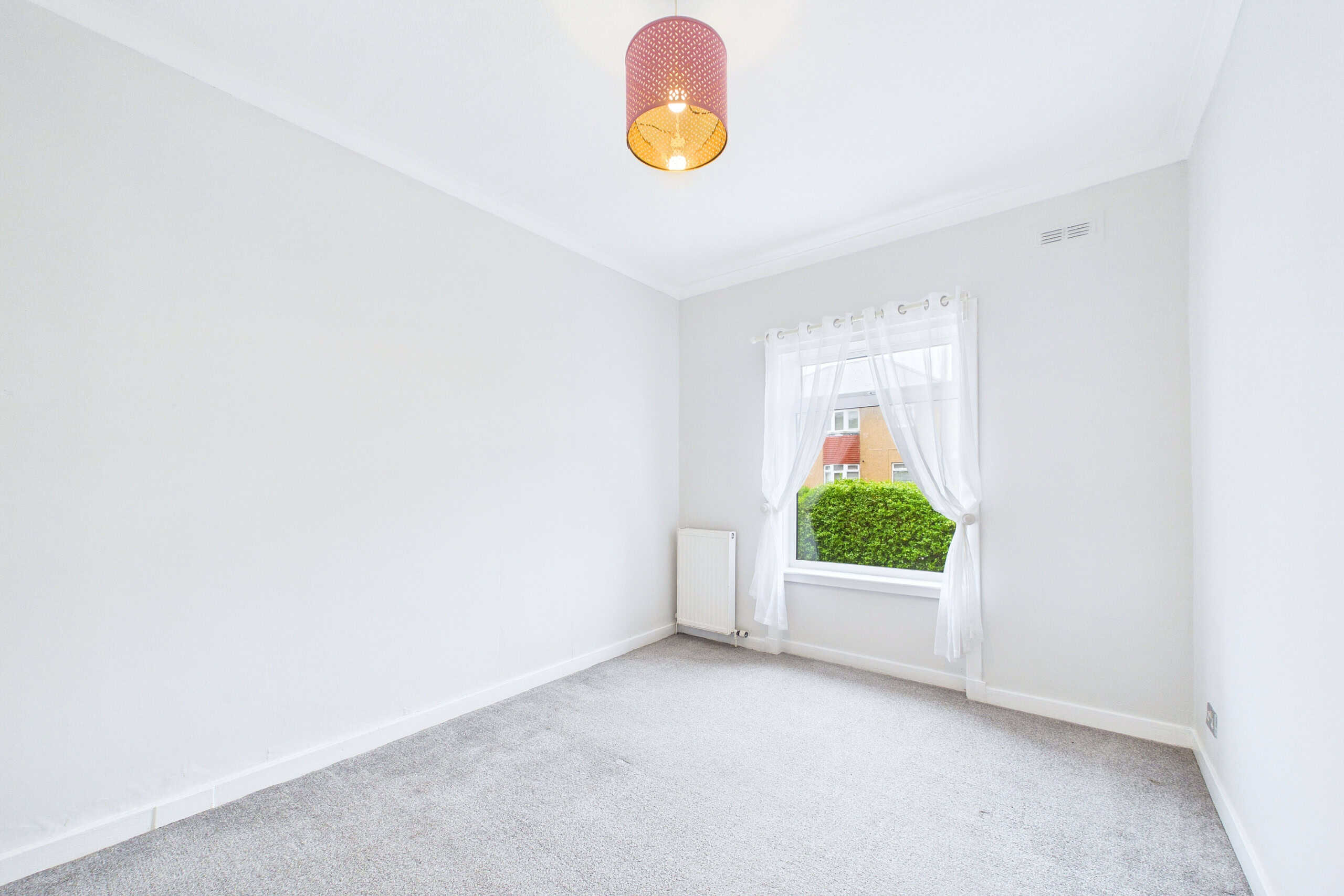 three-bedroom ground floor cottage flat for sale in Hillington