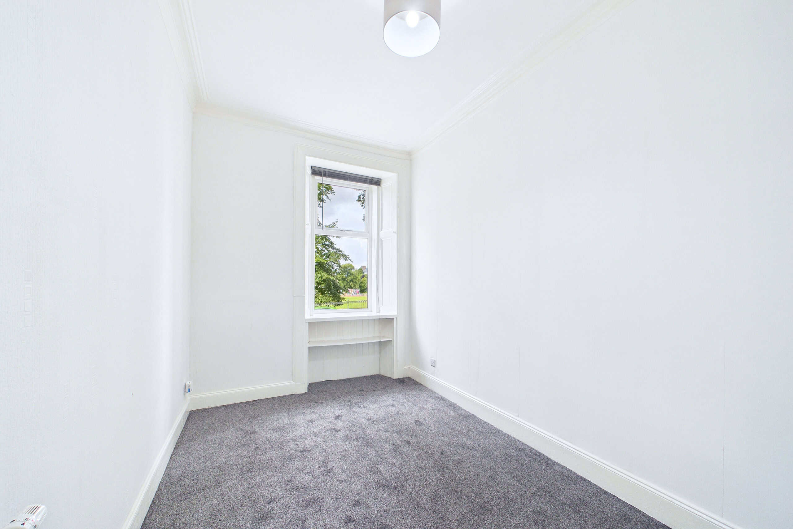 Charming Two-Bedroom Ground Floor Tenement Flat for Sale in Paisley